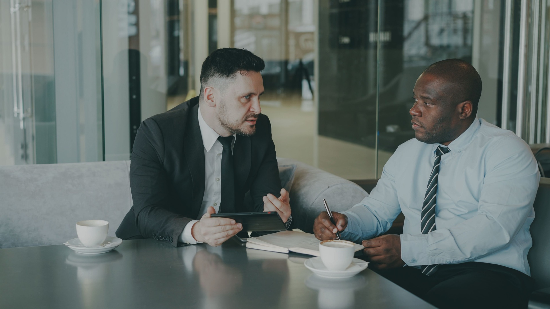 Business partners discussing plans together